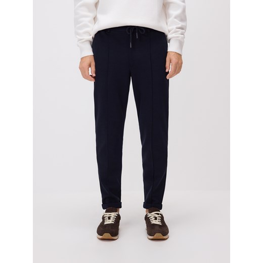 Reserved - Spodnie chino slim - granatowy ze sklepu Reserved w kategorii Spodnie męskie - zdjęcie 185947073