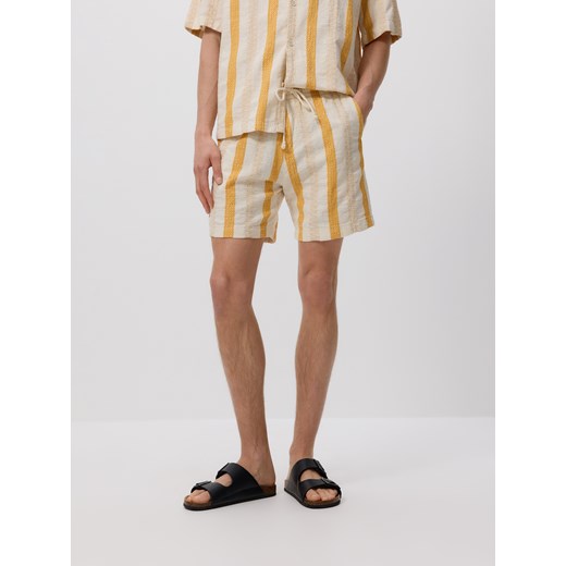 Reserved - Bawełniane szorty jogger - bursztynowy ze sklepu Reserved w kategorii Spodenki męskie - zdjęcie 185947873