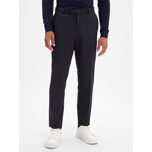 BOSS Męskie spodnie z wełny dziewiczej Baukasten - H-Gio-MM-C-NF Mężczyźni Slim Fit granatowy jednolity - id: 783593-0003-00240 - marki BOSS HUGO BOSS - 185957330 BOSS Męskie spodnie z wełny dziewiczej Baukasten - H-Gio-MM-C-NF Mężczyźni Slim Fit granatowy jednolity ze sklepu vangraaf w kategorii Spodnie męskie - zdjęcie 185957330