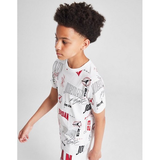 JORDAN T-SHIRT ARC AOP TEE WHT/BLK/RED ze sklepu JD Sports  w kategorii T-shirty chłopięce - zdjęcie 185979420