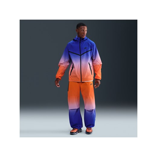 Męskie spodnie z tkaniny Nike Tech - Niebieski ze sklepu Nike poland w kategorii Spodnie męskie - zdjęcie 185994691