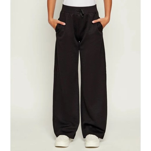 Guess Spodnie dresowe | Relaxed fit ze sklepu Gomez Fashion Store w kategorii Spodnie dziewczęce - zdjęcie 185997362