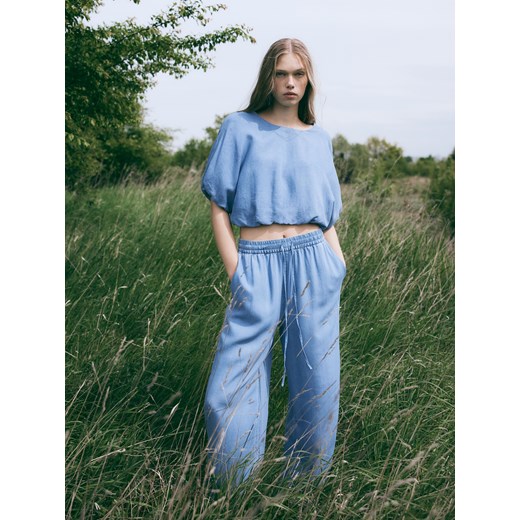 Reserved - Jeansy wide leg z lyocellu - niebieski ze sklepu Reserved w kategorii Jeansy damskie - zdjęcie 186003520