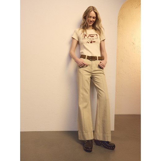 Reserved - Jeansy flare z przeszyciem - złamana biel ze sklepu Reserved w kategorii Jeansy damskie - zdjęcie 186005324