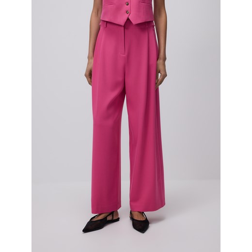 Reserved - Szerokie spodnie - intensywny róż ze sklepu Reserved w kategorii Spodnie damskie - zdjęcie 186025930