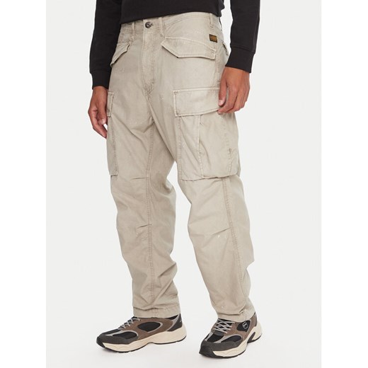 G-Star Raw Spodnie materiałowe MA1 Cargo D26945-D388 Beżowy Regular Fit ze sklepu MODIVO w kategorii Spodnie męskie - zdjęcie 186028523