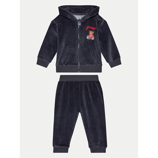 Guess Dres I4BG05 KAVN4 Granatowy Relaxed Fit ze sklepu MODIVO w kategorii Dresy dla niemowlaka - zdjęcie 186028890