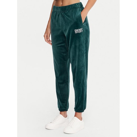 DKNY Sport Spodnie dresowe DP5P3702 Zielony Regular Fit ze sklepu MODIVO w kategorii Spodnie damskie - zdjęcie 186029760