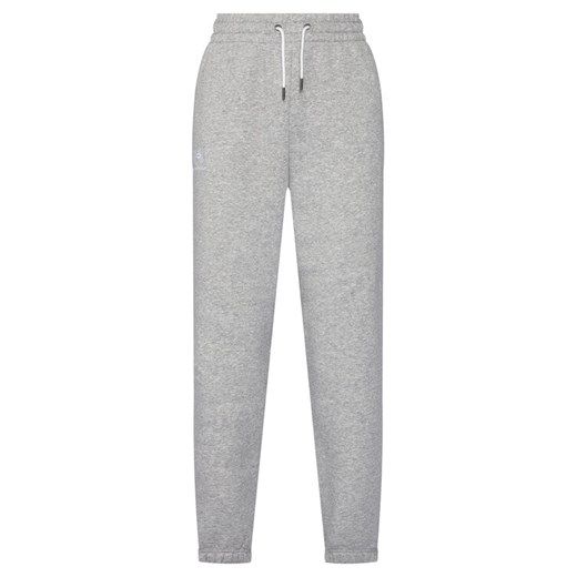 Under Armour Spodnie dresowe Essential Fleece Joggers 1373034 Szary Regular Fit ze sklepu MODIVO w kategorii Spodnie damskie - zdjęcie 186030524