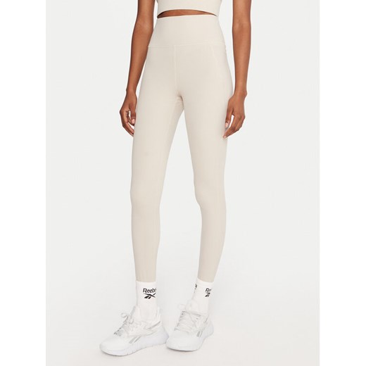 Reebok Legginsy Reebok X Ewa Chodakowska RK25313CCW Beżowy Slim Fit ze sklepu MODIVO w kategorii Spodnie damskie - zdjęcie 186032462