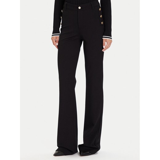 Guess Spodnie materiałowe W5BB16 KCMU2 Czarny Flare Fit ze sklepu MODIVO w kategorii Spodnie damskie - zdjęcie 186032903