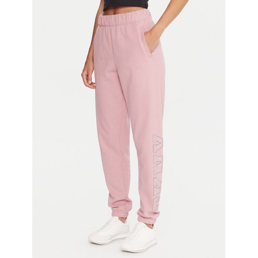 DKNY Sport Spodnie dresowe DP5P3737 Różowy Regular Fit ze sklepu MODIVO w kategorii Spodnie damskie - zdjęcie 186032971