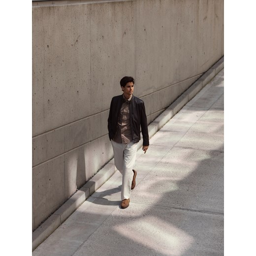 Reserved - Spodnie straight fit z wiskozą - złamana biel ze sklepu Reserved w kategorii Spodnie męskie - zdjęcie 186069084