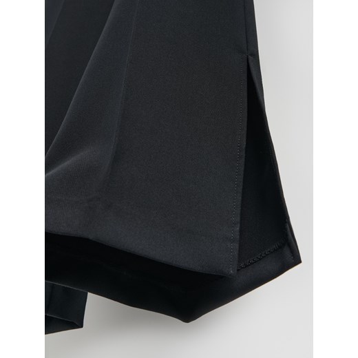 Reserved - Spodnie z rozcięciami - czarny Reserved M Reserved