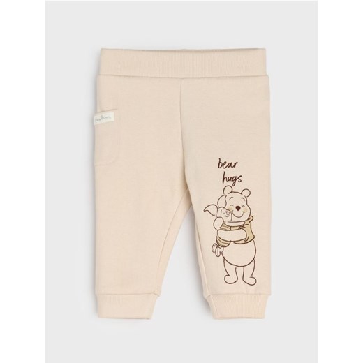 Sinsay - Spodnie z polarem w środku Winnie the Pooh - beżowy ze sklepu Sinsay w kategorii Odzież dla niemowląt - zdjęcie 186083810