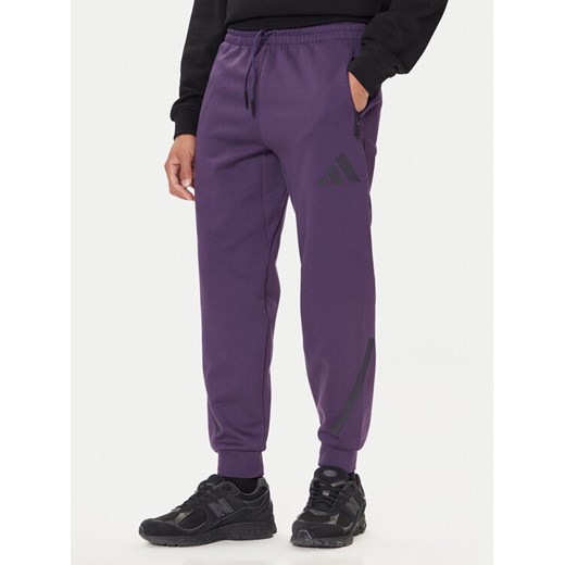 adidas Spodnie dresowe Z.N.E. JW4726 Fioletowy Loose Fit ze sklepu MODIVO w kategorii Spodnie męskie - zdjęcie 186096511