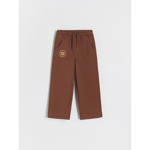 Reserved - Spodnie dresowe z haftem - ciemnobrązowy ze sklepu Reserved w kategorii Spodnie dziewczęce - zdjęcie 186128702