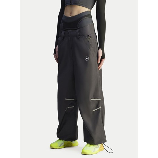 adidas by Stella McCartney Spodnie dresowe Woven JI5248 Czarny Loose Fit ze sklepu MODIVO w kategorii Spodnie damskie - zdjęcie 186136513