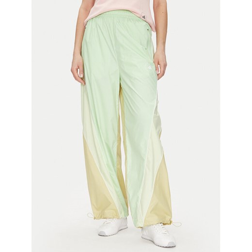 adidas by Stella McCartney Spodnie dresowe JI5134 Zielony Loose Fit ze sklepu MODIVO w kategorii Spodnie damskie - zdjęcie 186136624