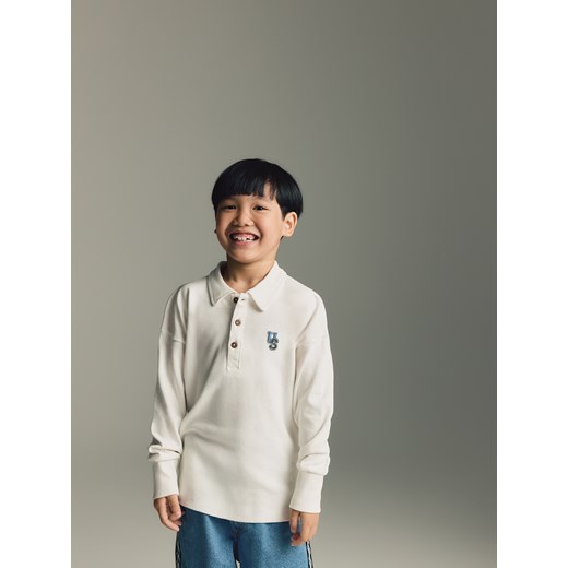 Reserved - Bawełniany longsleeve polo - złamana biel ze sklepu Reserved w kategorii T-shirty chłopięce - zdjęcie 186148301