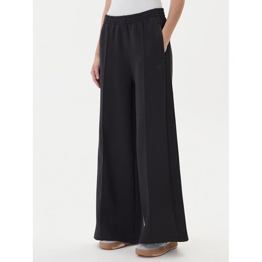 adidas Spodnie dresowe adicolor Spacer 3-Stripes JV7500 Czarny Wide Leg ze sklepu MODIVO w kategorii Spodnie damskie - zdjęcie 186151412