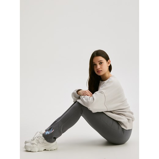 Reserved - Spodnie Lilo i Stitch - ciemnoszary ze sklepu Reserved w kategorii Spodnie dziewczęce - zdjęcie 186182632