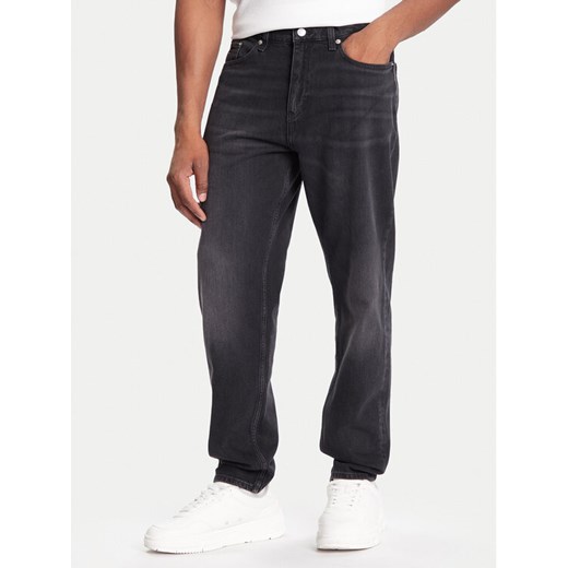 Tommy Jeans Jeansy DM0DM22182 Czarny Regular Fit ze sklepu MODIVO w kategorii Jeansy męskie - zdjęcie 186186681