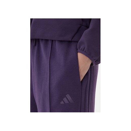 adidas Dres Energize JX0536 Fioletowy Regular Fit L MODIVO