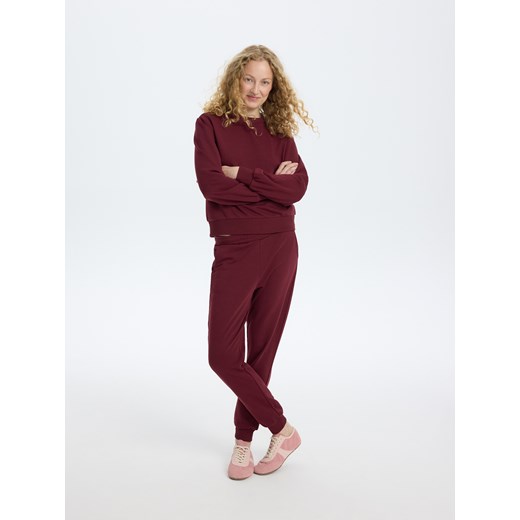 Reserved - Spodnie dresowe jogger z bawełną - bordowy ze sklepu Reserved w kategorii Spodnie damskie - zdjęcie 186190672