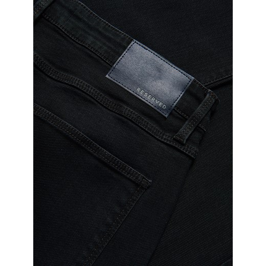 Reserved - Jeansy slim fit z efektem sprania - granatowy Reserved 32 Reserved