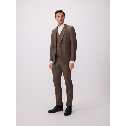 Reserved - Spodnie garniturowe z wełną - brązowy ze sklepu Reserved w kategorii Spodnie męskie - zdjęcie 186194154