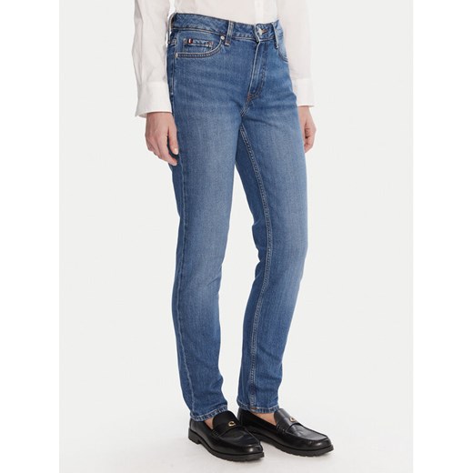 Tommy Hilfiger Jeansy WW0WW46721 Niebieski Slim Fit ze sklepu MODIVO w kategorii Jeansy damskie - zdjęcie 186200524