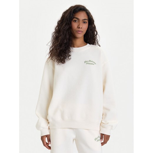 New Balance Bluza WT53516 Biały Relaxed Fit ze sklepu MODIVO w kategorii Bluzy damskie - zdjęcie 186200571
