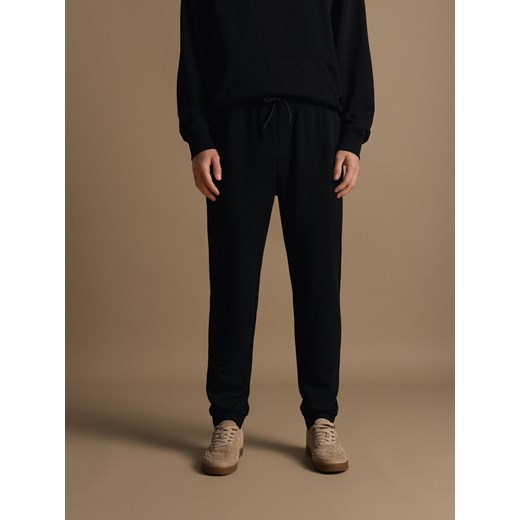 Reserved - Bawełniane spodnie dresowe - czarny ze sklepu Reserved w kategorii Spodnie męskie - zdjęcie 186213311