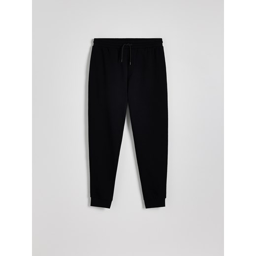 Reserved - Bawełniane spodnie dresowe - czarny ze sklepu Reserved w kategorii Spodnie męskie - zdjęcie 186214460
