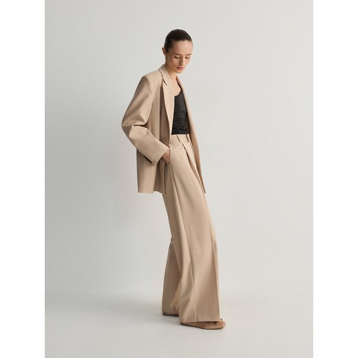 Reserved - Spodnie w kant z wiskozą - beżowy Reserved 40 promocja Reserved