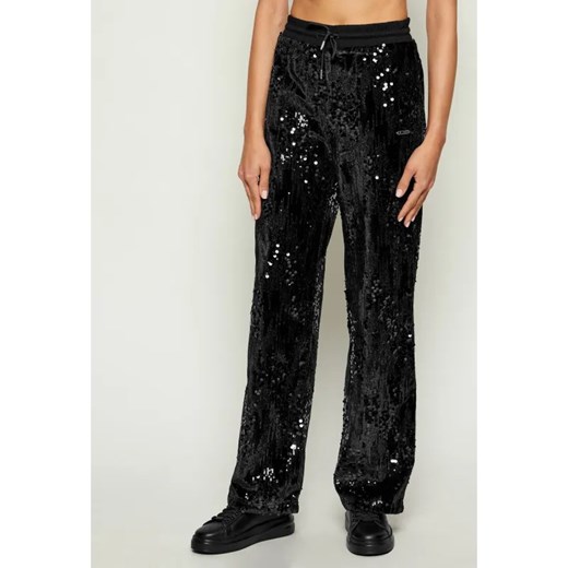 GUESS ACTIVE Spodnie | Relaxed fit ze sklepu Gomez Fashion Store w kategorii Spodnie damskie - zdjęcie 186229484