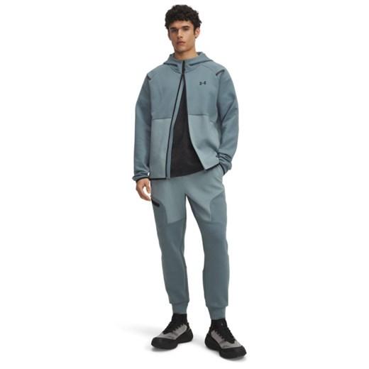 Męskie spodnie treningowe Under Armour UA Unstoppable Flc Jgr Eu - niebieskie ze sklepu Sportstylestory.com w kategorii Spodnie męskie - zdjęcie 186230123