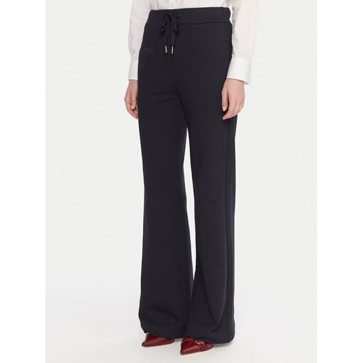 Maryley Spodnie dresowe 25IB558/07BL Granatowy Relaxed Fit ze sklepu MODIVO w kategorii Spodnie damskie - zdjęcie 186245423