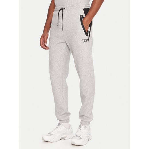 Reebok Spodnie dresowe RK25145CCM Szary Regular Fit ze sklepu MODIVO w kategorii Spodnie męskie - zdjęcie 186267533
