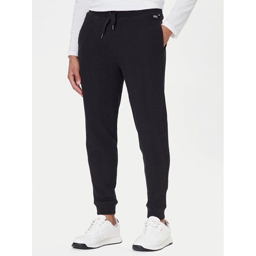 BOSS Spodnie dresowe Structure 50540577 Czarny Regular Fit ze sklepu MODIVO w kategorii Spodnie męskie - zdjęcie 186290980