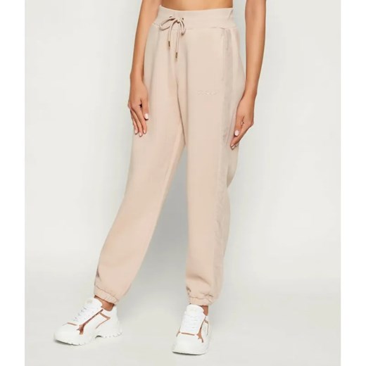 GUESS ACTIVE Spodnie dresowe AELIA | Regular Fit - id: GV255W000071R13 - marki Guess - 186306241 GUESS ACTIVE Spodnie dresowe AELIA | Regular Fit ze sklepu Gomez Fashion Store w kategorii Spodnie damskie - zdjęcie 186306241