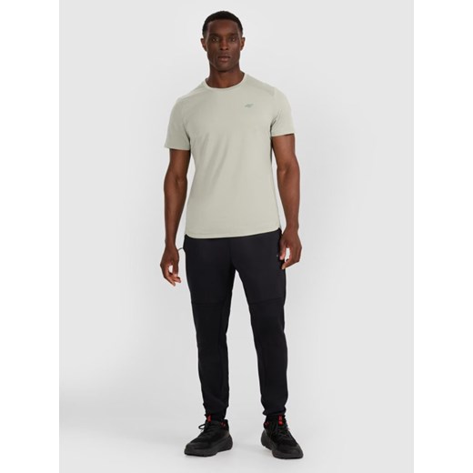 Męska koszulka treningowa 4F 4FWAW25TFTSM1457 - turkusowa ze sklepu Sportstylestory.com w kategorii T-shirty męskie - zdjęcie 186321310