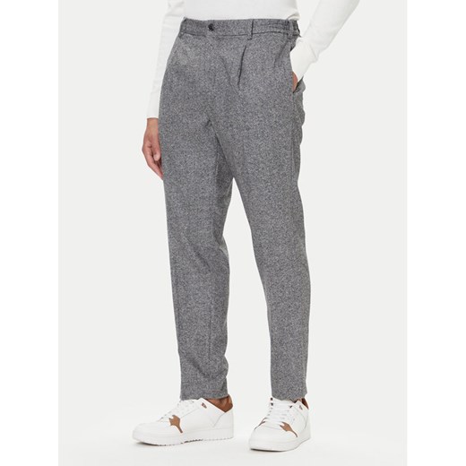 Tommy Hilfiger Spodnie materiałowe Harlem MW0MW41340 Szary Regular Fit ze sklepu MODIVO w kategorii Spodnie męskie - zdjęcie 186323513