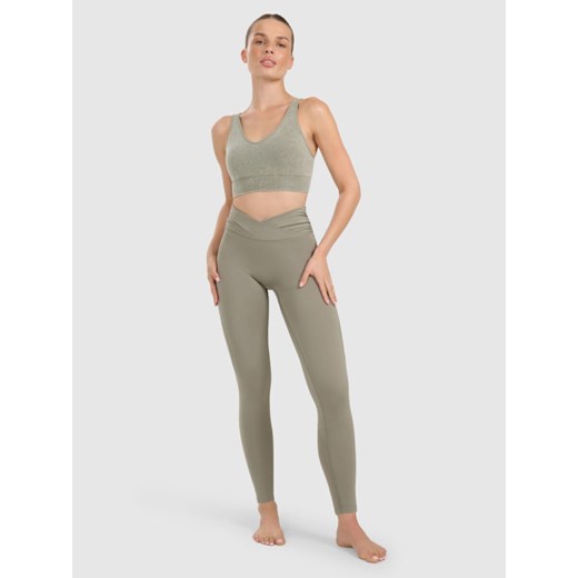Damskie legginsy do jogi i pilatesu 4F 4FWAW25TFTIF369 - oliwkowe ze sklepu Sportstylestory.com w kategorii Spodnie damskie - zdjęcie 186350751