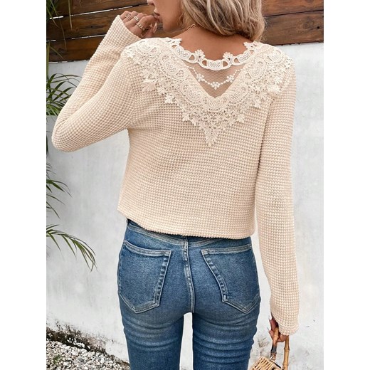 Bluzka damska z ozdobnym wycięciem na plecach - Kremowy XS ze sklepu Intimica.pl w kategorii Bluzki damskie - zdjęcie 186352714