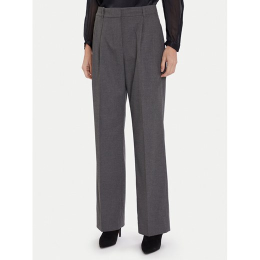 Tommy Hilfiger Spodnie materiałowe WW0WW48358 Szary Relaxed Fit ze sklepu MODIVO w kategorii Spodnie damskie - zdjęcie 186379020