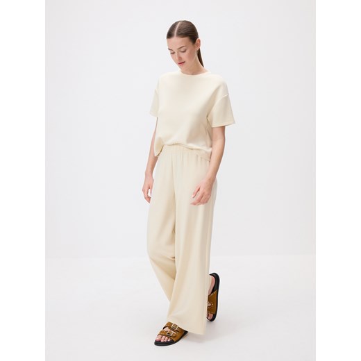 Reserved - Dresowe spodnie z modalem - jasnożółty ze sklepu Reserved w kategorii Spodnie damskie - zdjęcie 186407543