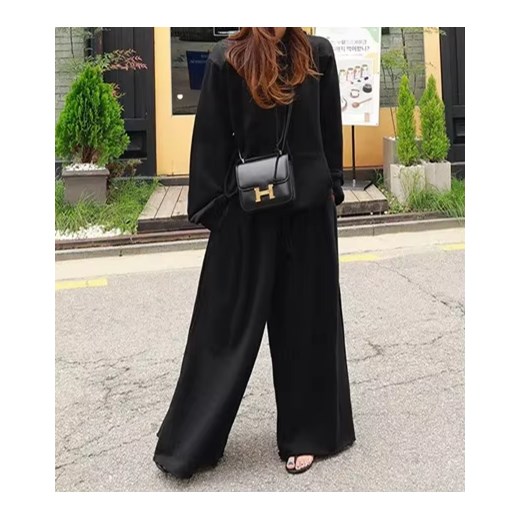 Obszerne spodnie dresowe damskie - Czarny S ze sklepu Intimica.pl w kategorii Spodnie damskie - zdjęcie 186421313