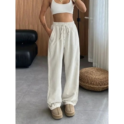 Prążkowane spodnie dresowe damskie - Kremowy S ze sklepu Intimica.pl w kategorii Spodnie damskie - zdjęcie 186421981